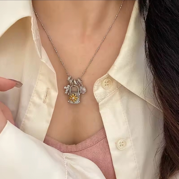 Anthropologie Jewelry - Silver Padlock Charm Necklace with Yellow Flower